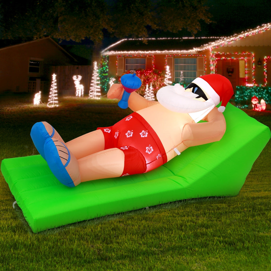 1.8m Santa on a sun lounger Christmas Inflatable
