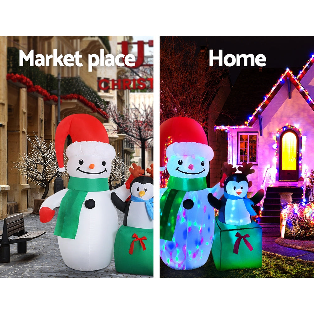1.8m Inflatable Snowman with penguin present