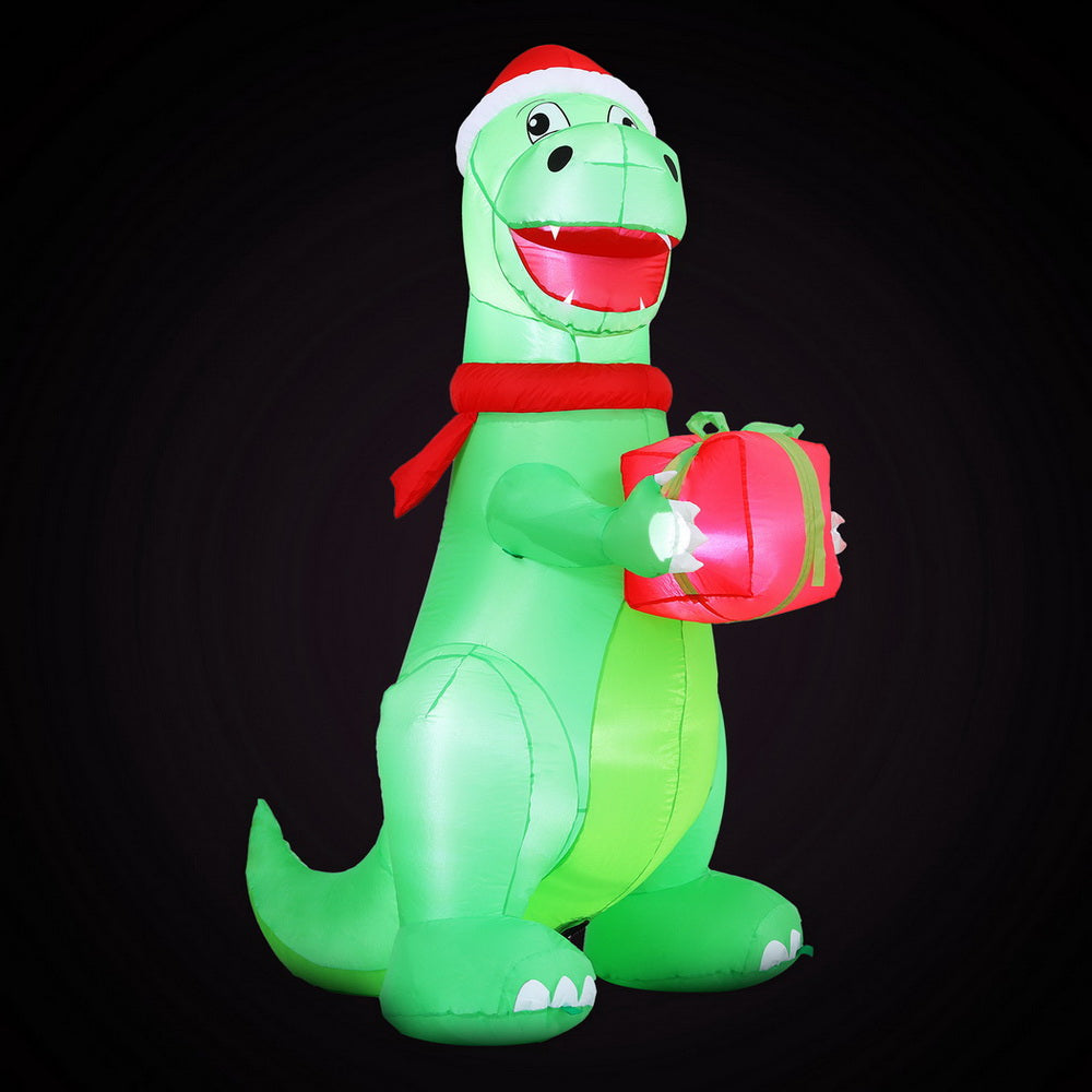 1.8m Inflatable Dinosaur holding a gift