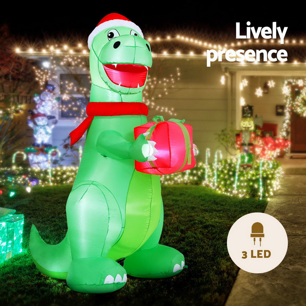 1.8m Inflatable Dinosaur holding a gift