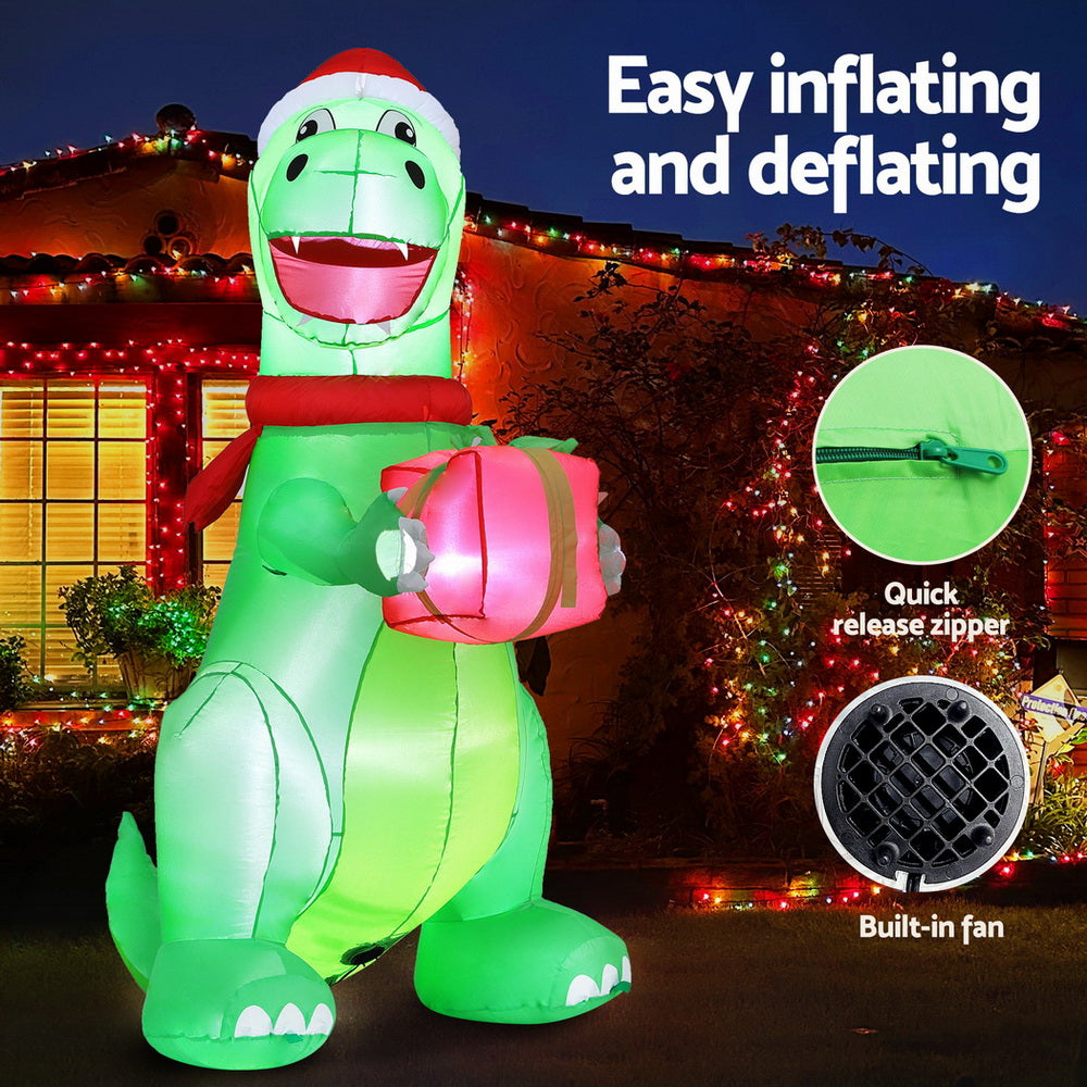 1.8m Inflatable Dinosaur holding a gift