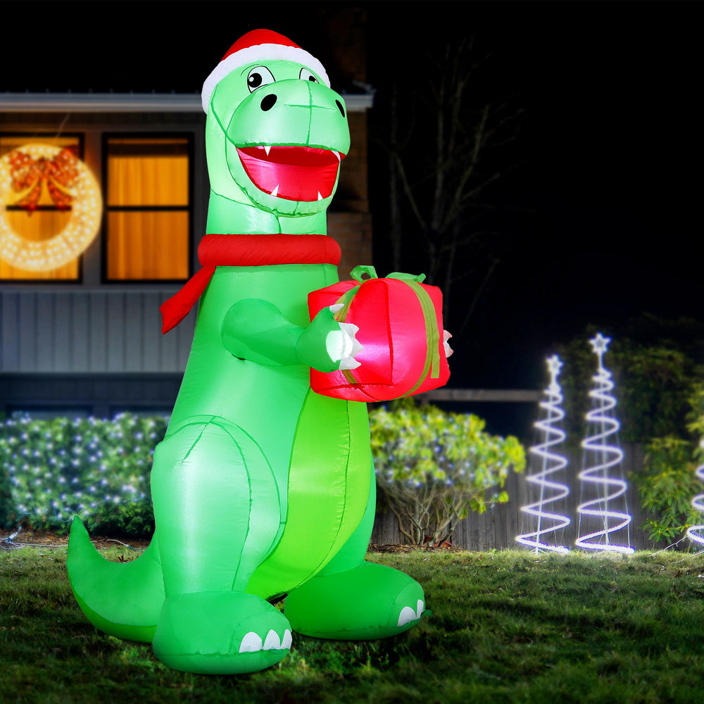 1.8m Inflatable Dinosaur holding a gift