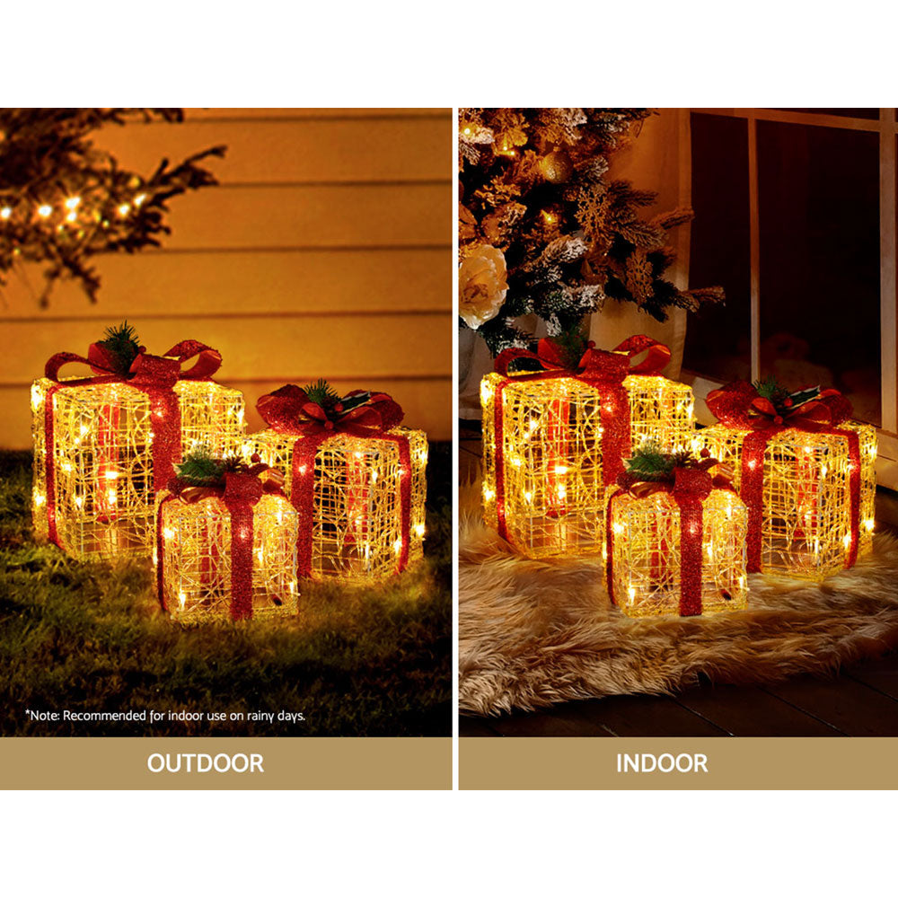 Set of three Christmas gifts in lights